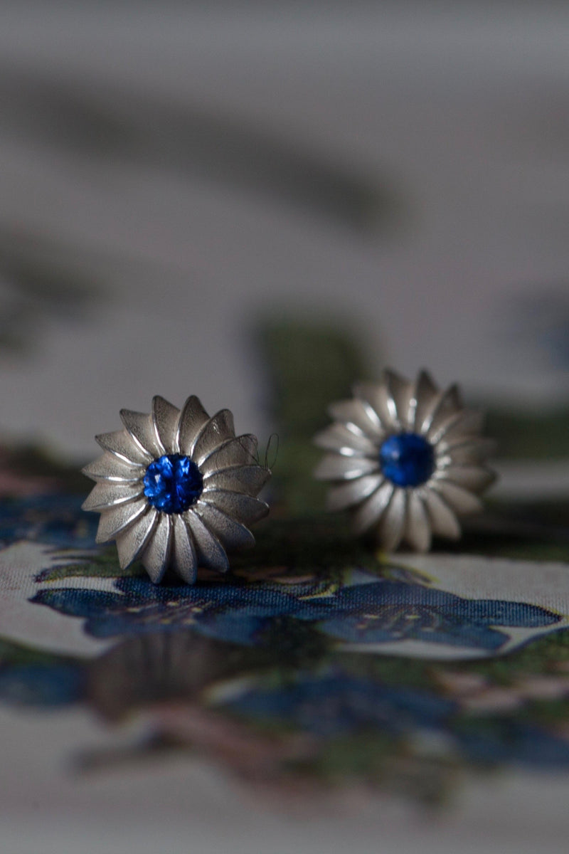 My September Sapphire Birthstone Satsuma Studs are subtly striped and set with gemstones