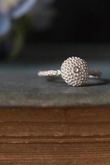 My Bobbled Pollen Stacking Ring has a circular centrepiece surrounded by my signature bobble texture 