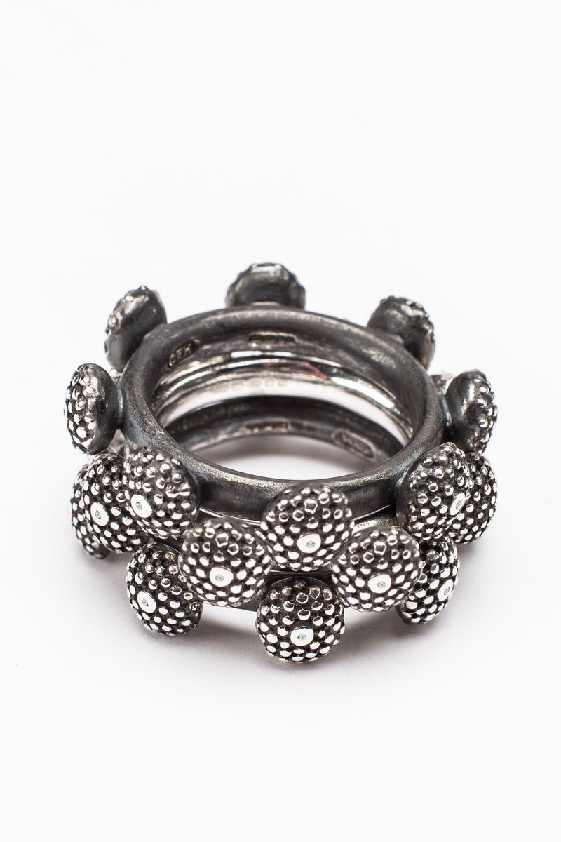 My bold statement Snake Eye Trio Ring has 3 three bands and 24 ovals set with tiny diamonds